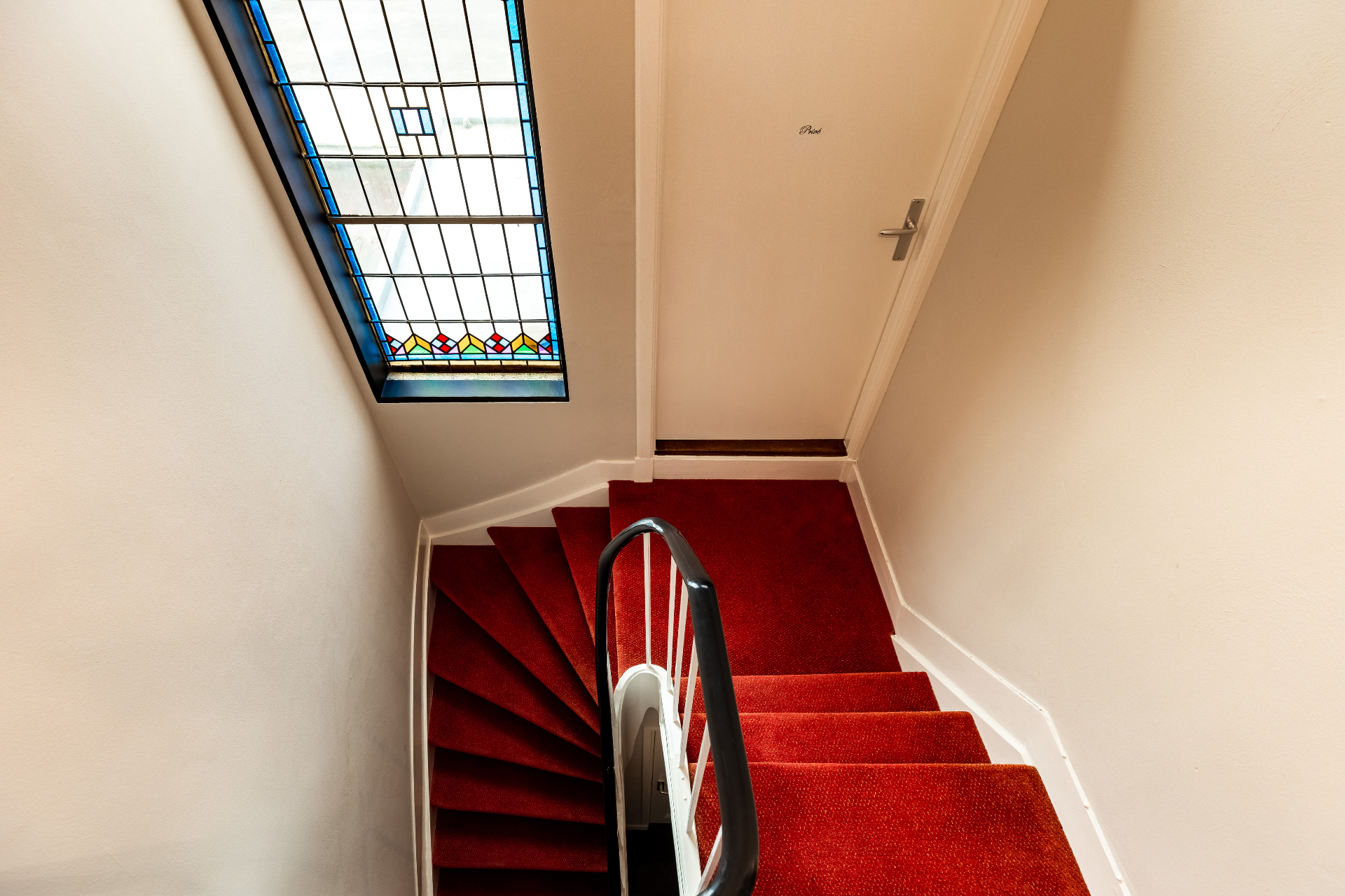 Trap met glas-in-lood